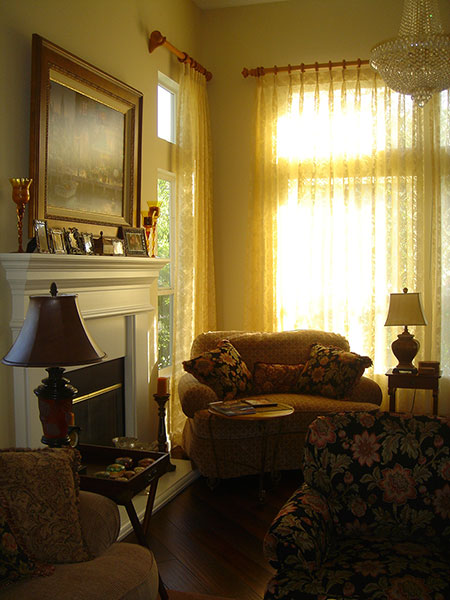 Hardwood floors enhance the serenity of this formal living room in Corona, CA